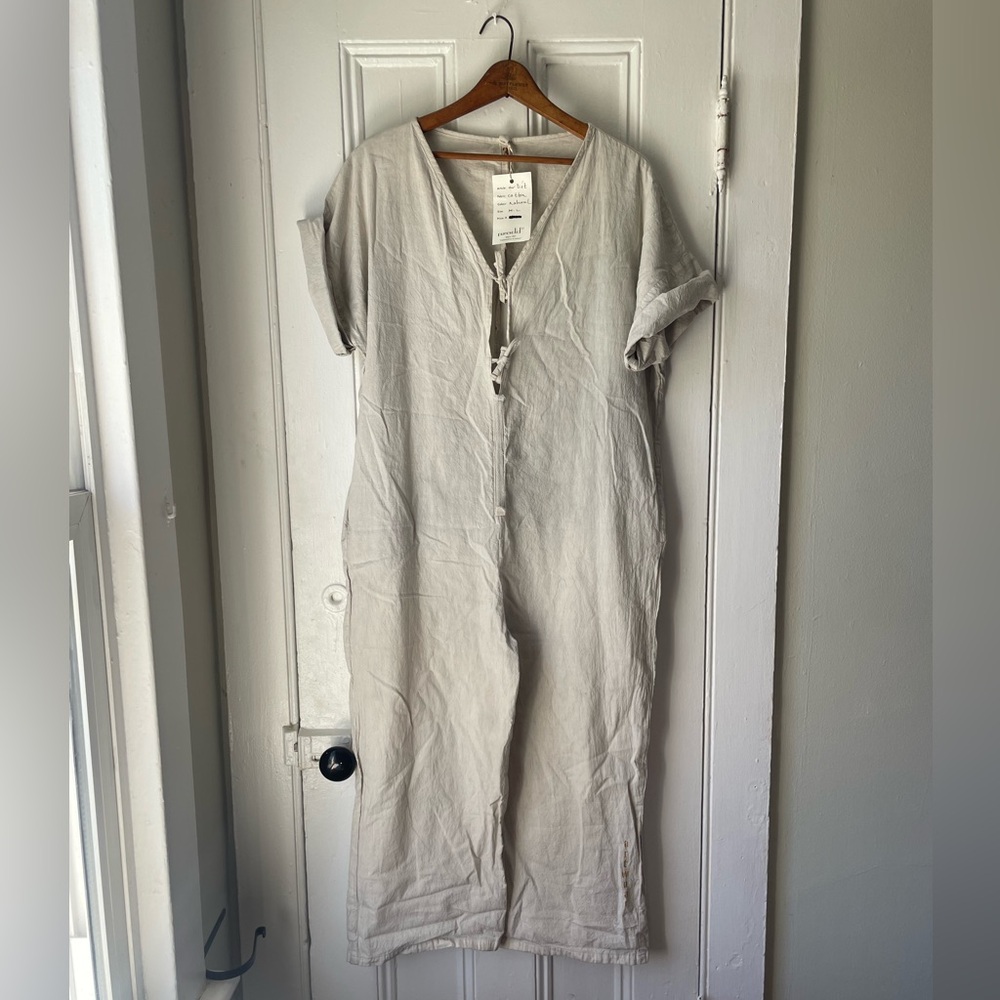 “Pure Solid 13” never been worn women’s onesie from South African company